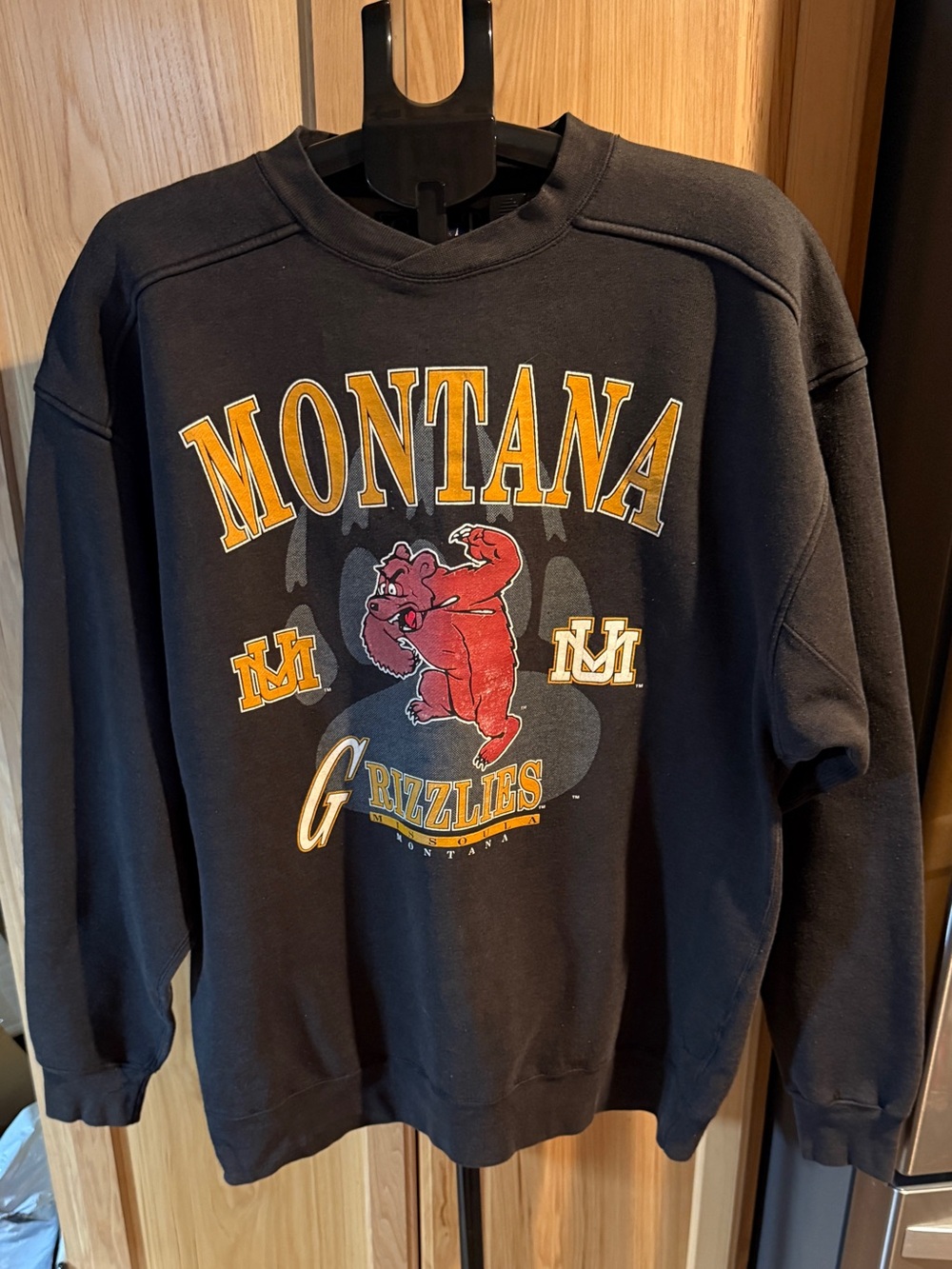 Vintage 1990’s Montana Grizzlies Black Crewneck Sweatshirt with Red Bear Graphic